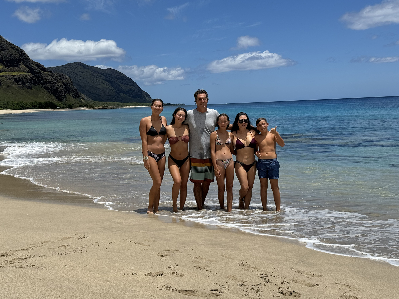 Michael Shower and his family on the beach