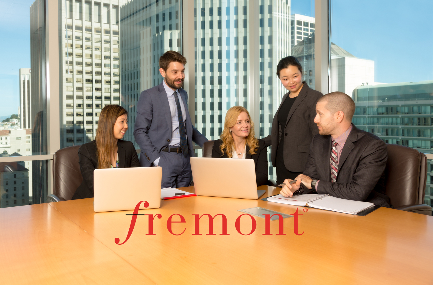 Members of the Fremont Group at a conference table