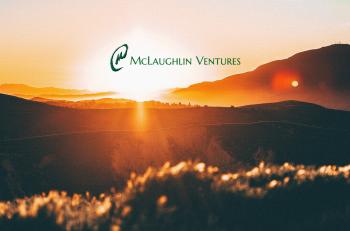 Sunset with an overlay of the McLaughlin Ventures logo